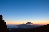 cloud;cone;crater;craters;dawn;fog;mist;misty;mountain;mystery;peak;peaks;snow;sunrise;volcanic;volcano