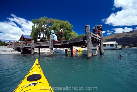 kayak;kayaks;kayaking;kayaker;kayakers;vibrant;colour;holiday;vacation;relax;recreation;recreational;water;lake;paddle;paddling;river;central-otago;yellow-kayak;yellow-kayaks;triangle;tip;front;peak;people;jetty;duck;ducks;feeding