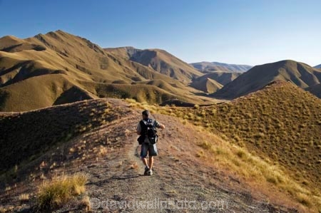 Central-Otago;high-country;highcountry;highland;highlands;Lindis-Pass;mountain;mountains;N.Z.;New-Zealand;North-Otago;NZ;Otago;people;person;photographer;photographers;range;ranges;ridge;ridgeline;ridgelines;ridges;SI;snow-tussock;snow-tussocks;South-Island;tussock;tussock-land;tussock-lands;tussockland;tussocklands;tussocks;uplands