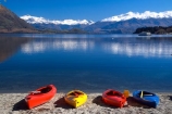 kayak;kayaks;red-kayak;red-kayaks;yellow-kayak;yellow-kayaks;blue-kayak;blue-kayaks;red;yellow;blue;lake;lake-wanaka;still;calm;mountain;mountains;snow-cap;snow-caps;snow-capped;sand;shore;beach;holiday;boat;vacation;relax;relaxing;reflection;reflecting