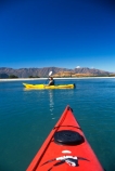 kayak;kayaks;kayaking;kayaker;kayakers;vibrant;colour;holiday;vacation;relax;recreation;recreational;water;lake;paddle;paddling;river;central-otago;red-kayak;red-kayaks;yellow-kayak;yellow-kayaks;green-water;triangle;tip;front;side;peak