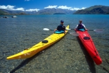 kayak;kayaks;kayaking;kayaker;kayakers;vibrant;colour;holiday;vacation;relax;recreation;recreational;water;lake;paddle;paddling;river;central-otago;shallow-water;riverbed;shadow;shadows;triangle;red-kayak;red-kayaks;yellow-kayak;yellow-kayaks;tip;front;peak;front