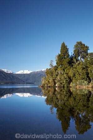 alp;alpine;alps;beautiful;beauty;bush;calm;endemic;forest;forests;green;lake;Lake-Kaniere;lakes;main-divide;mount;mountain;mountain-peak;mountainous;mountains;mountainside;mt;mt.;N.Z.;native;native-bush;natives;natural;nature;New-Zealand;NZ;placid;quiet;rain-forest;rain-forests;rain_forest;rain_forests;rainforest;rainforests;range;ranges;reflection;reflections;S.I.;scene;scenic;serene;SI;smooth;snow;snow-capped;snow_capped;snowcapped;snowy;South-Is.;South-Island;southern-alps;still;Sunny-Bight;tranquil;tree;trees;water;Wesl-Coast;Westland;wood;woods