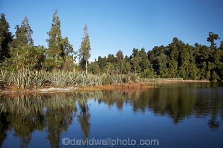 calm;lake;Lake-Mapourika;lakes;N.Z.;New-Zealand;NZ;placid;quiet;reflection;reflections;S.I.;serene;SI;smooth;South-Is.;South-Island;South-West-New-Zealand-World-Heritage-Area;still;Te-Poutini-National-Park;Te-Wahipounamu;tranquil;water;West-Coast;Westland;Westland-National-Park;World-Heritage-Area