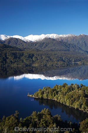 adventure;adventure-tourism;aerial;aerial-photo;aerial-photograph;aerial-photographs;aerial-photography;aerial-photos;aerial-view;aerial-views;aerials;alp;alpine;alps;altitude;boat;boats;calm;canoe;canoeing;canoes;cold;high-altitude;kayak;kayaker;kayakers;kayaking;kayaks;lake;Lake-Mapourika;lakes;main-divide;mount;mountain;mountain-peak;mountainous;mountains;mountainside;mt;mt.;N.Z.;New-Zealand;NZ;paddle;paddler;paddlers;paddling;peak;peaks;placid;quiet;range;ranges;reflection;reflections;S.I.;sea-kayak;sea-kayaker;sea-kayakers;sea-kayaking;sea-kayaks;serene;SI;smooth;snow;snow-capped;snow_capped;snowcapped;snowy;South-Is.;South-Island;South-West-New-Zealand-World-Heritage-Area;southern-alps;still;summit;summits;Te-Poutini-National-Park;Te-Wahipounamu;tranquil;water;West-Coast;Westland;westland-national-park;winter;World-Heritage-Area