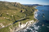 12-Mile-Bluff;aerial;aerial-photo;aerial-photograph;aerial-photographs;aerial-photography;aerial-photos;aerial-view;aerial-views;aerials;bend;bends;bluff;bluffs;cliff;cliffs;coast;coastal;coastline;coastlines;coasts;corner;corners;curve;curves;driving;highway;highways;Motukiekie-Rocks;N.Z.;New-Zealand;NZ;ocean;open-road;open-roads;road;road-trip;roads;S.I.;sea;shore;shoreline;shorelines;shores;SI;South-Island;State-Highway-6;State-Highway-Six;steep;Tasman-Sea;transport;transportation;travel;traveling;travelling;trip;Twelve-Mile-Bluff;water;West-Coast;Westland
