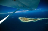 sand;coral;reef;ocean;sea;paradise;pacific;tropical;island;islands;resort;coast;coastine;holiday;vacation;holidays;beach;beaches;travel;tourism;travels;aerial;aerials;archipeligo;archipeligos;blue;oceana;scenic;scenics;seascape;seascapes;global-warming;sea-level-rise;strut;wing;wingtip;flight;flying