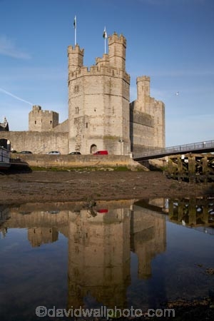 Afon-Seiont;battlement;battlements;Britain;British-Isles;building;buildings;Caernarfon;Caernarfon-Castle;Caernarfon-town-walls;calm;Carnarvon;Carnarvon-Castle;Castell-Caernarfon;castellated;castellations;castle;castles;crenellation;crenellations;Cymru;Dymar-dre;fort;fortification;fortress;fortresses;G.B.;GB;Great-Britain;Gwynedd;heritage;historic;historic-building;historic-buildings;historical;historical-building;historical-buildings;history;medieval-castle;medieval-castles;old;placid;quiet;reflection;reflections;River-Seiont;serene;smooth;still;stone-buidling;stone-building;stone-buildings;tradition;traditional;tranquil;U.K.;UK;UN-world-heritage-site;UNESCO-World-Heritage-Site;United-Kingdom;united-nations-world-heritage-site;Wales;water;Welsh-Castle;Welsh-Castles;Welsh-Flag;Welsh-flags;world-heritage;World-Heritage-Park;World-Heritage-site;World-Heritage-Sites