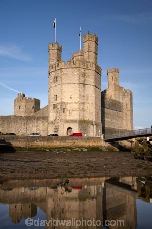 Afon-Seiont;battlement;battlements;Britain;British-Isles;building;buildings;Caernarfon;Caernarfon-Castle;calm;Carnarvon;Carnarvon-Castle;Castell-Caernarfon;castellated;castellations;castle;castles;crenellation;crenellations;Cymru;Dymar-dre;fort;fortification;fortress;fortresses;G.B.;GB;Great-Britain;Gwynedd;heritage;historic;historic-building;historic-buildings;historical;historical-building;historical-buildings;history;medieval-castle;medieval-castles;old;placid;quiet;reflection;reflections;River-Seiont;serene;smooth;still;stone-buidling;stone-building;stone-buildings;tradition;traditional;tranquil;U.K.;UK;UN-world-heritage-site;UNESCO-World-Heritage-Site;United-Kingdom;united-nations-world-heritage-site;Wales;water;Welsh-Castle;Welsh-Castles;Welsh-Flag;Welsh-flags;world-heritage;World-Heritage-Park;World-Heritage-site;World-Heritage-Sites