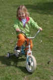 girl;girls;little;child;children;play;playing;playground;play_ground;play-ground;playgrounds;play_grounds;play-grounds;grass;green;grassy;outdoor;outdoors;outside;playtime;fun;moving;movement;childhood;happiness;happy;joy;kid;kids;bike;bikes;cycle;cycles;bicycle;bicycles;two_wheeler;two-wheeler;two_wheelers;two-wheelers;training-wheels;training_wheels;learn;learns;learning;learner;first-ride;ride;rider;riding;riders;training;daughter